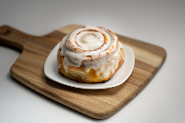 Baked to perfection with cinnamon and brown sugar layered through each wrap of our dough, this treat is topped off with our delectable cream cheese frosting. Available in mini size too!