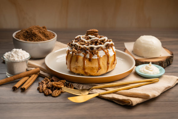 Everything you love about our original Cinnamon Roll, now with a sweet upgrade! The Nutty Maple Roll is topped with our rich and creamy maple glaze, roasted nuts, sweet whipped topping, and of course, our exquisite cream cheese frosting. It’s the perfect treat!